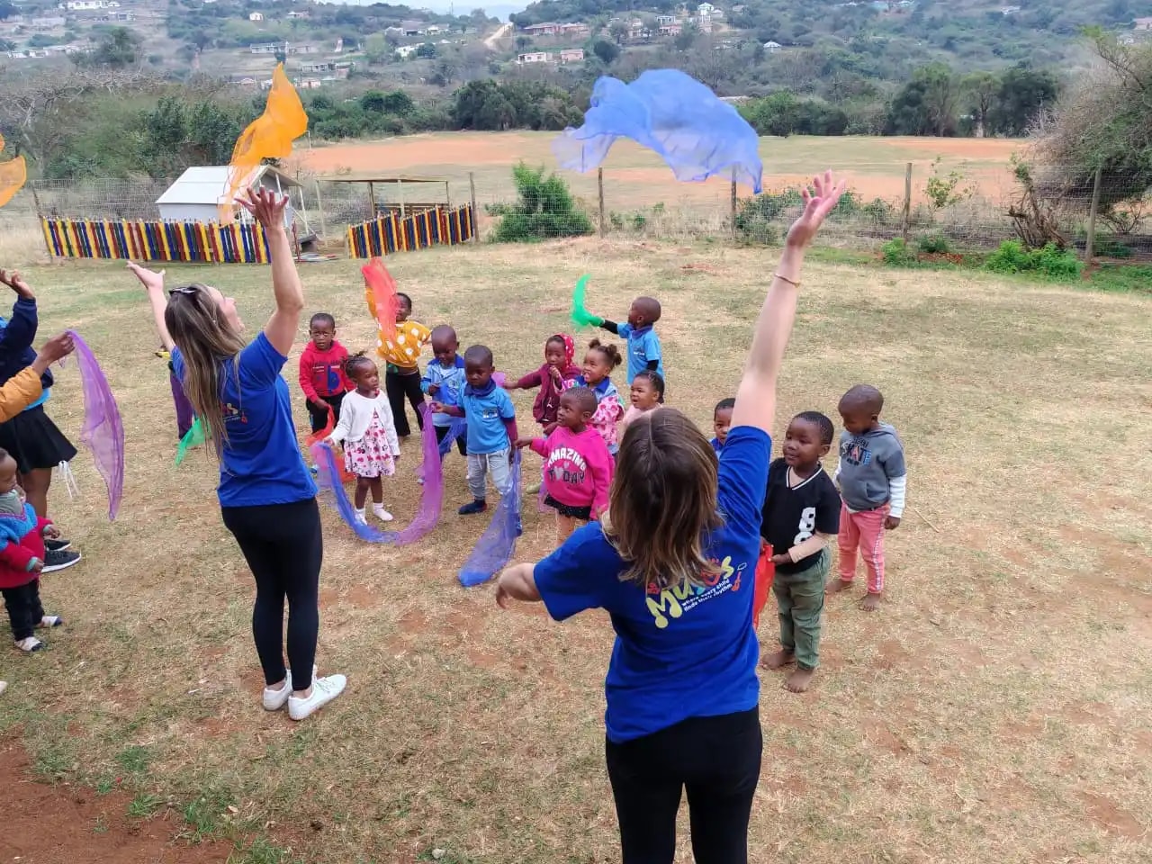 Children enjoying music and movement at Lusana