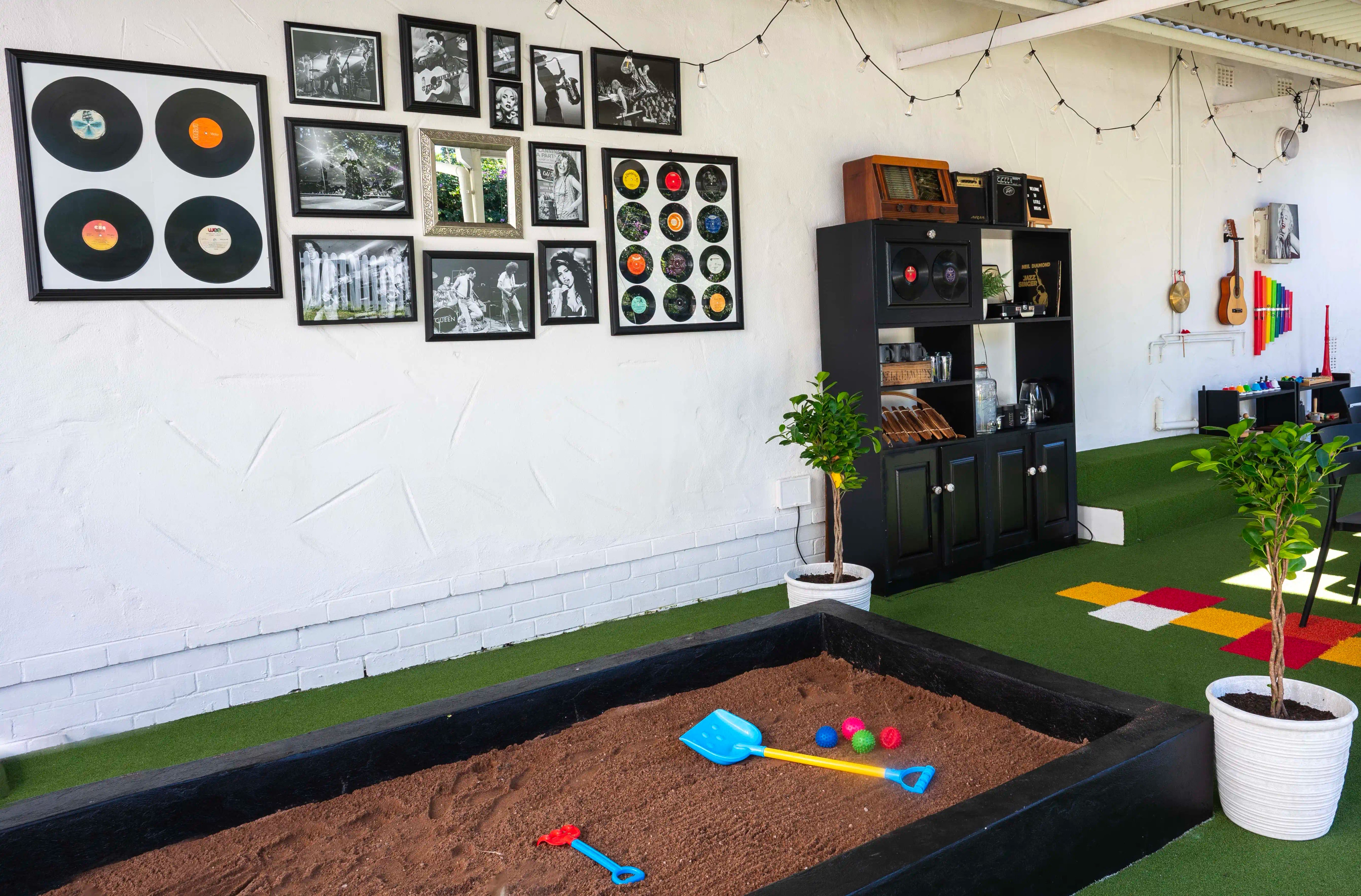 Indoor sandpit and vinyl record wall
